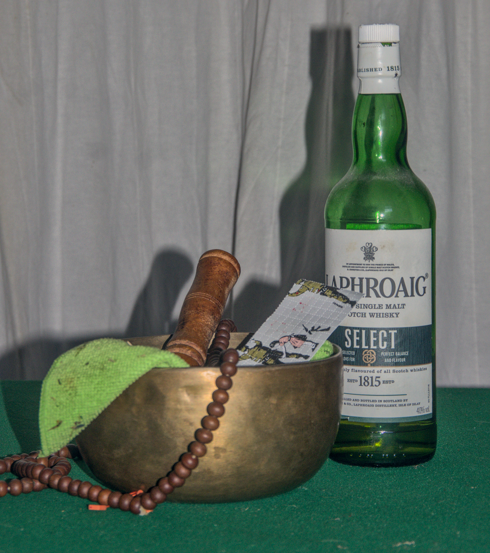 singing bowl, mala, whiskey